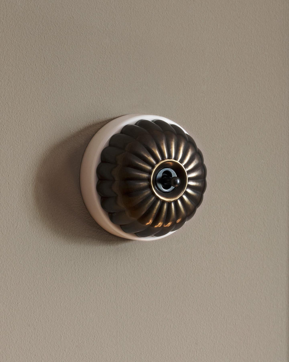 The Jelly Toggle Switch - Oxidised Brass, White Base, Retract to Centre TEST