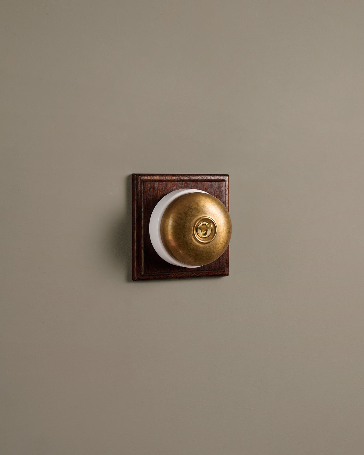 The Dolly Toggle Switch (1 Gang & Mahogany Finish Pattress) - Aged Brass with White Base. TEST