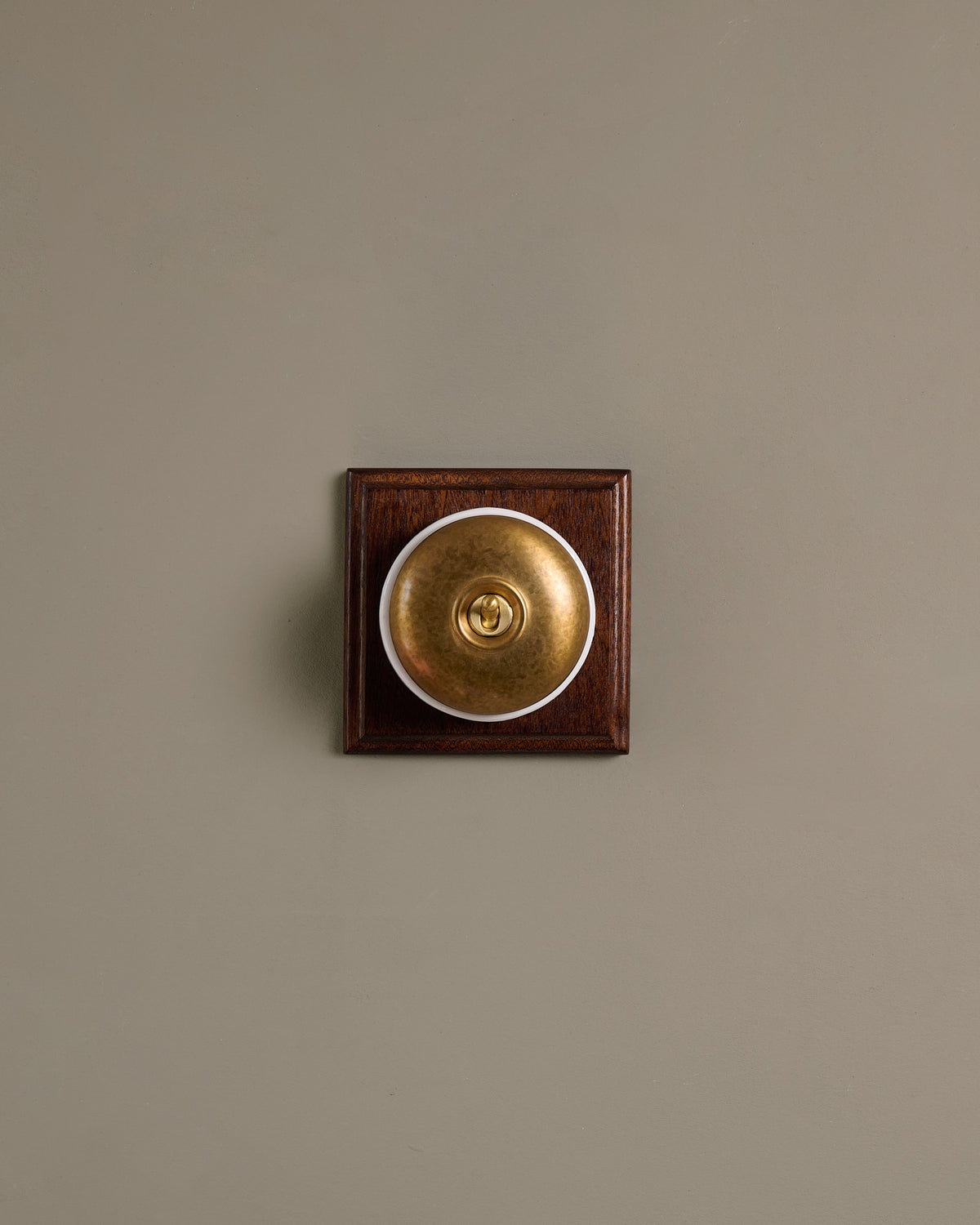 The Dolly Toggle Switch (1 Gang & Mahogany Finish Pattress) - Aged Brass with White Base. TEST