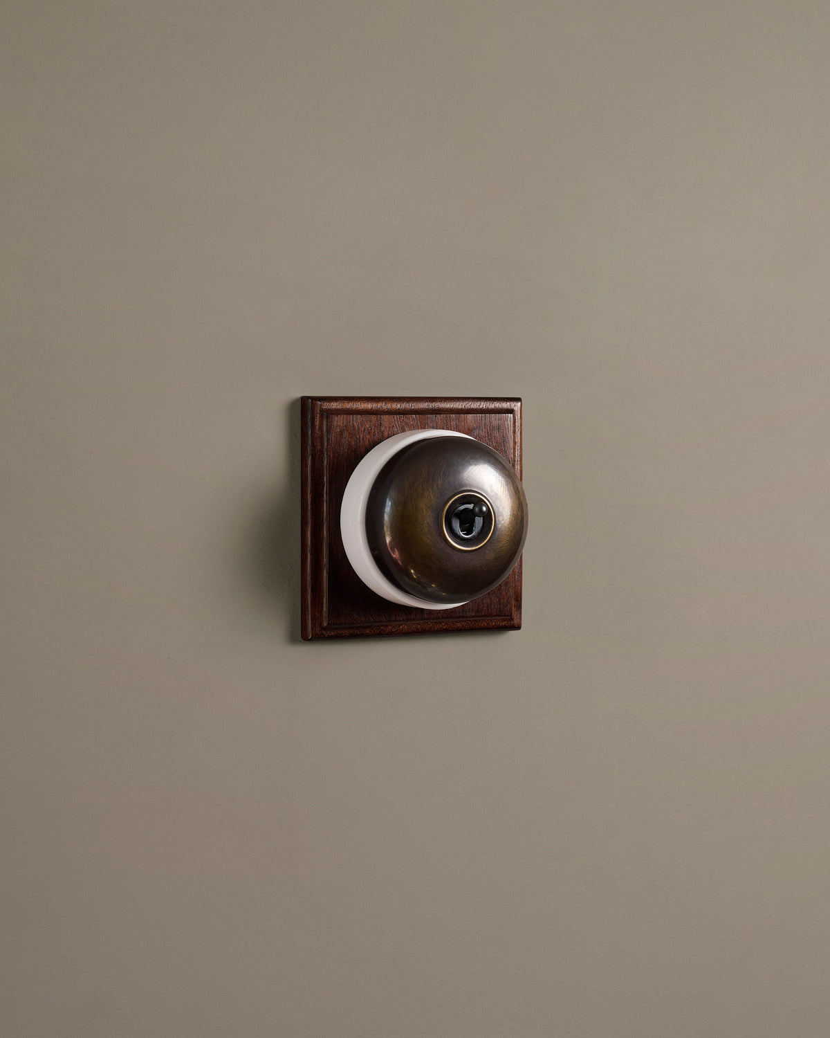 The Dolly Toggle Switch (1 Gang & Mahogany Finish Pattress) - Oxidised Brass with White Base. TEST