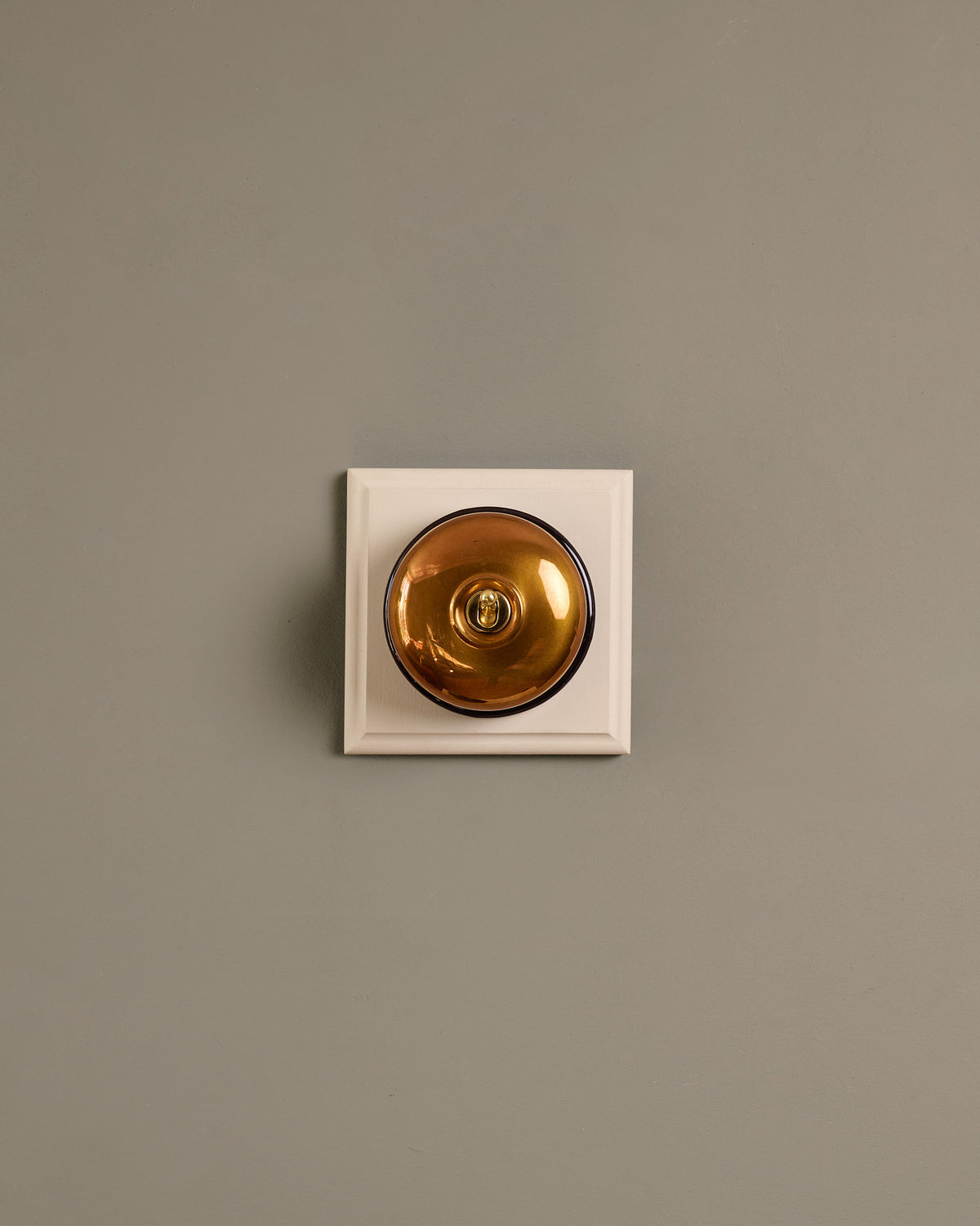 The Dolly Toggle Switch (1 Gang & Primed Maple Pattress) - Heirloom Brass with Black Base. TEST