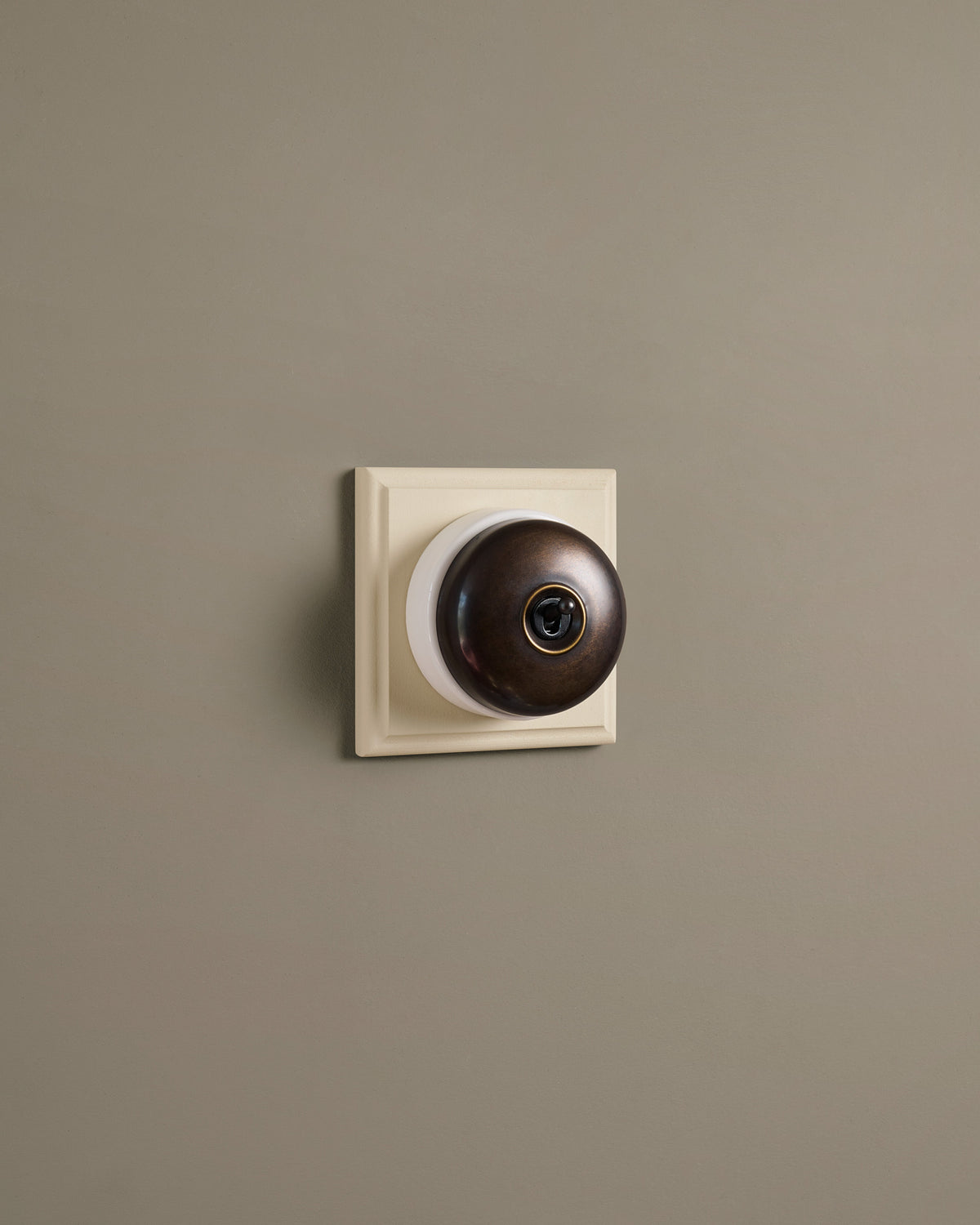 The Dolly Toggle Switch (1 Gang & Primed Maple Pattress) - Oxidised Brass with White Base. TEST