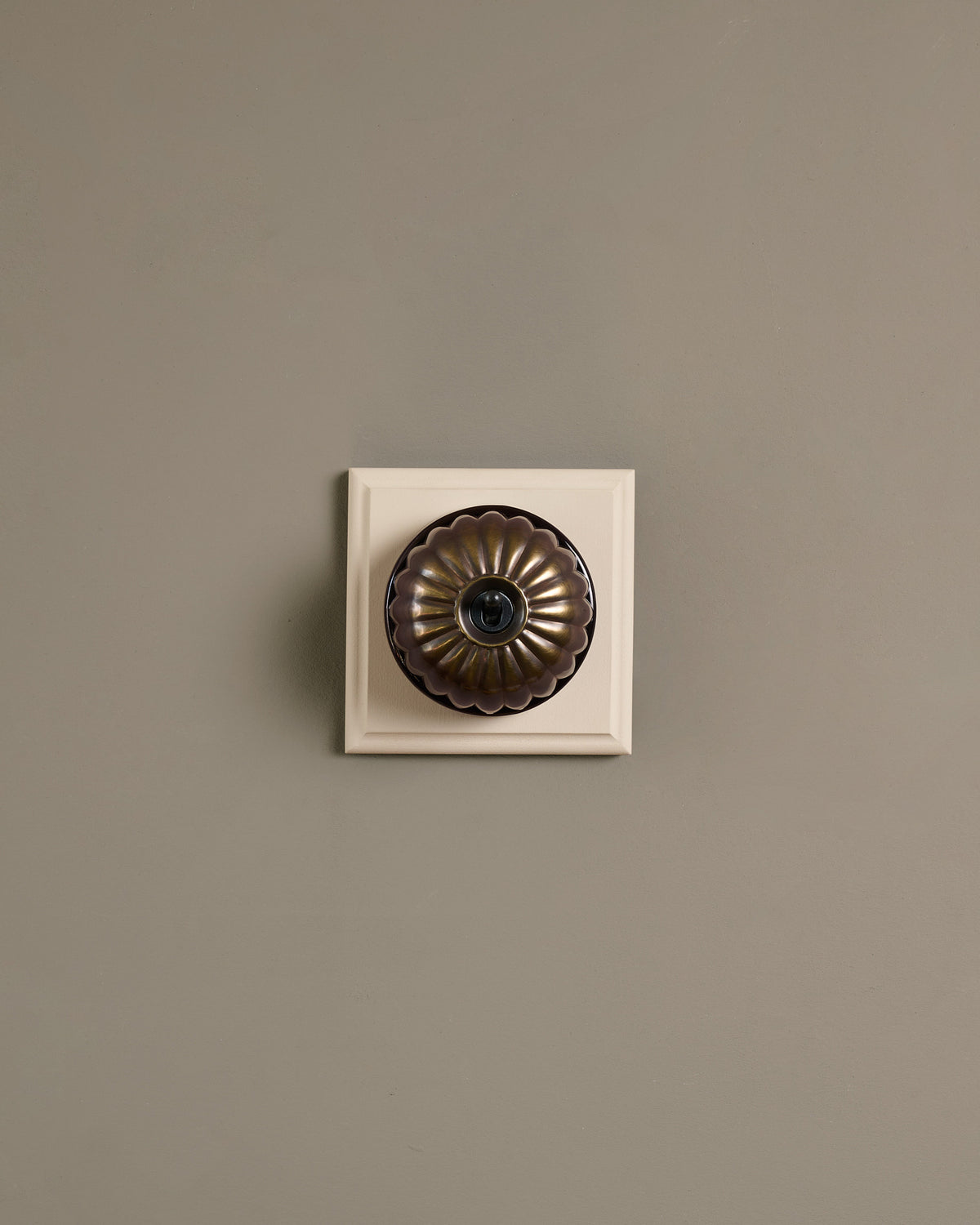 The Jelly Toggle Switch (1 Gang & Primed Maple Pattress) - Oxidised Brass with Black Base. TEST