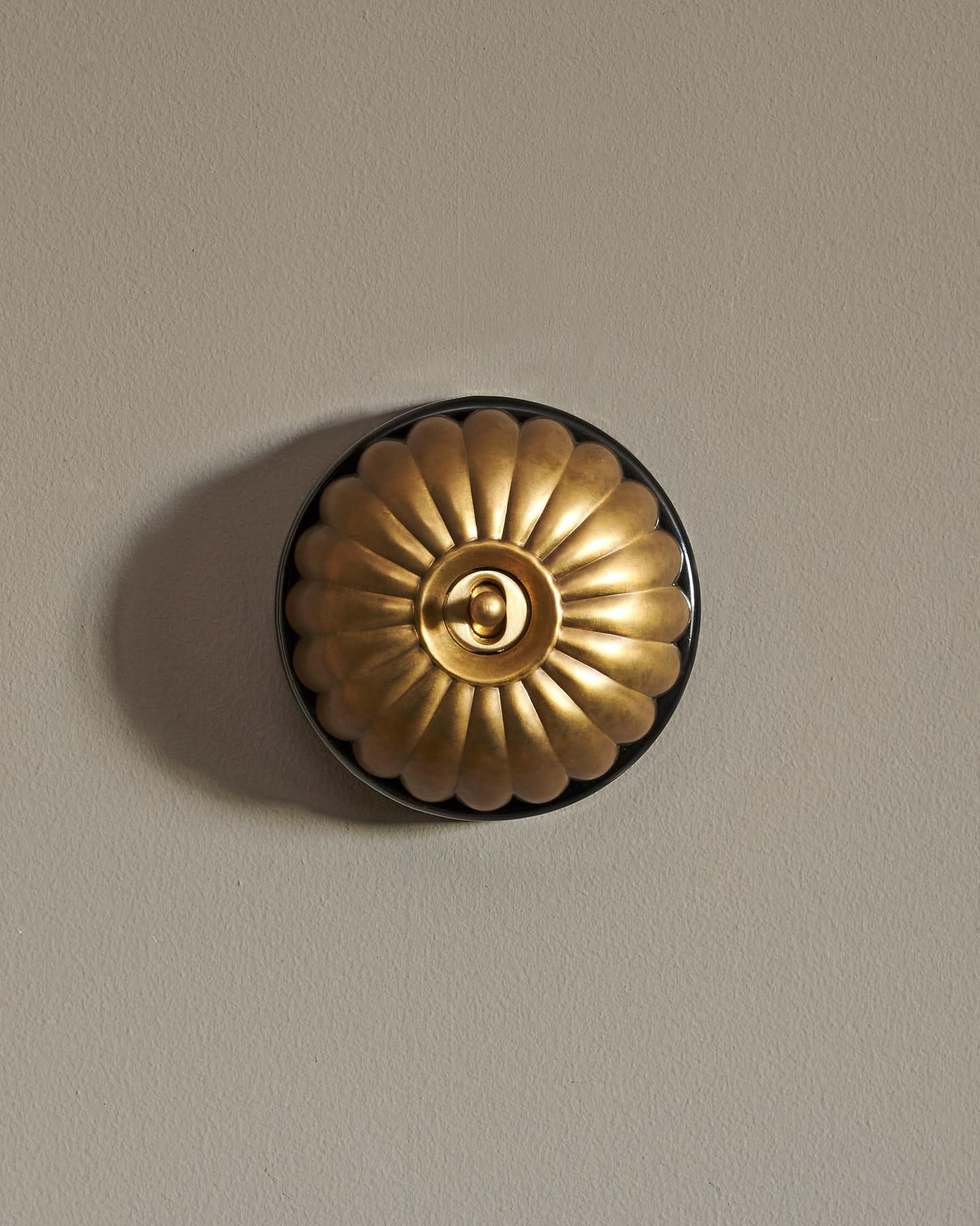 The Jelly Toggle Switch - Aged Brass, Black Base, Retract to Centre