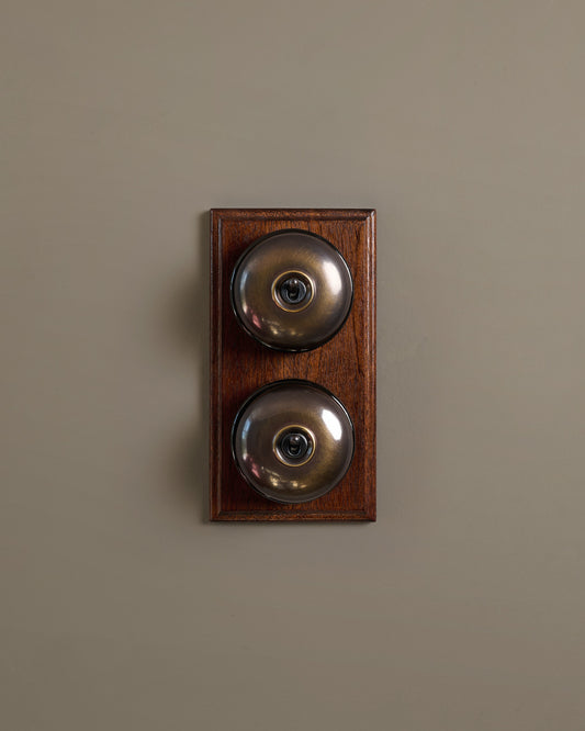 The Dolly Toggle Switch (2 Gang & Mahogany Finish Pattress) - Oxidised Brass with Black Base.