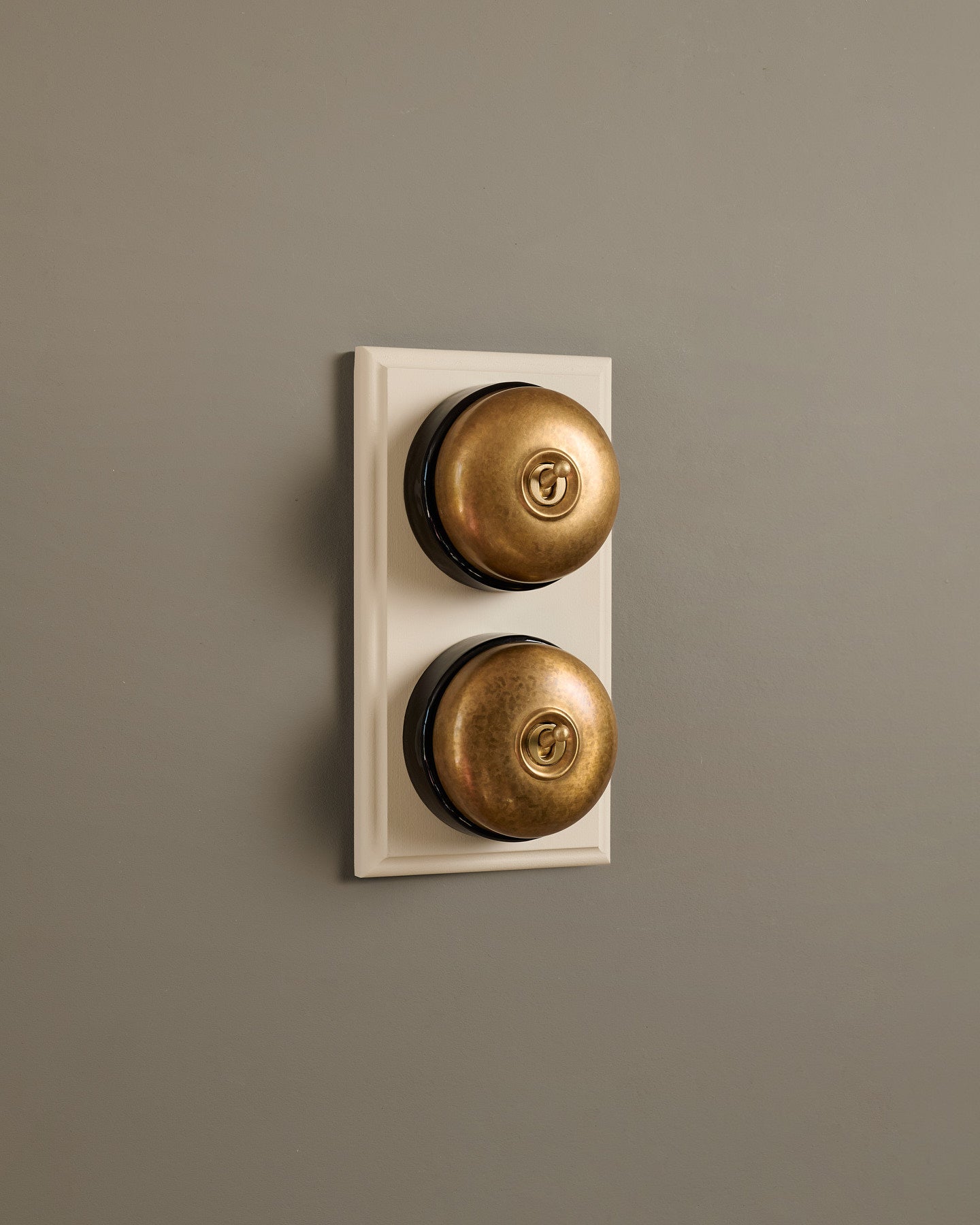 The Dolly Toggle Switch (2 Gang & Primed Maple Pattress) - Aged Brass with Black Base.