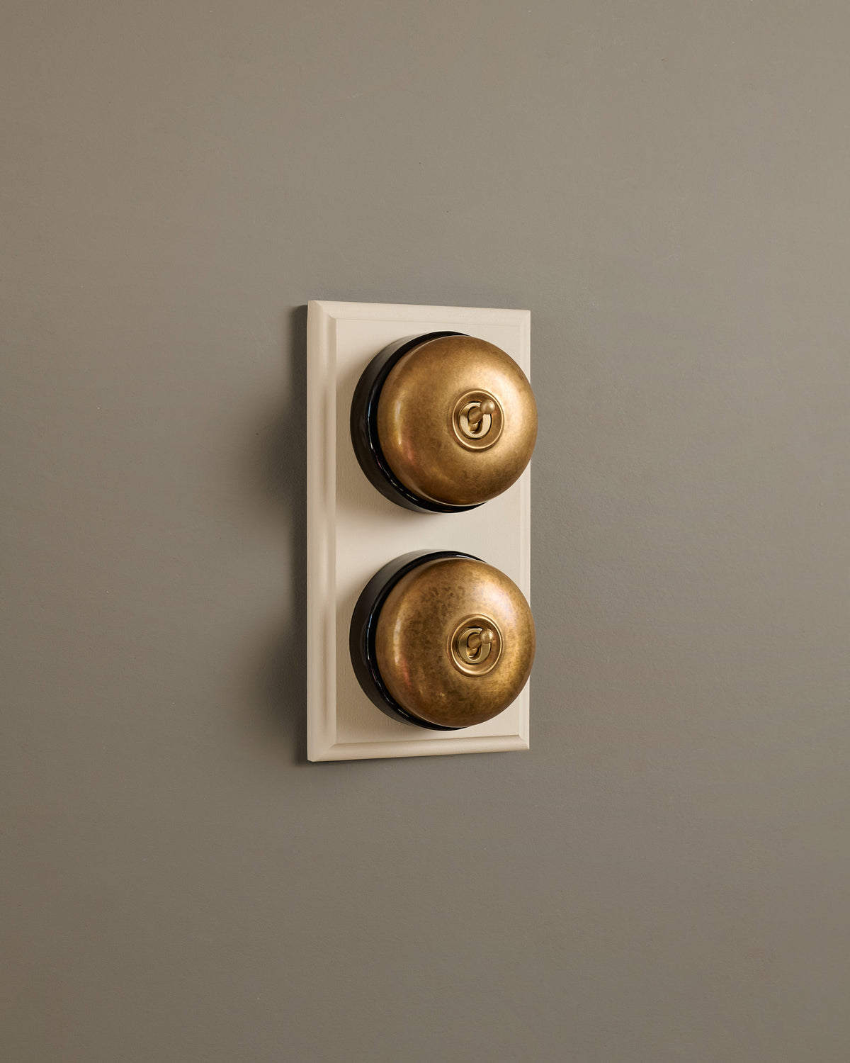 The Dolly Toggle Switch (2 Gang & Primed Maple Pattress) - Aged Brass with Black Base. TEST