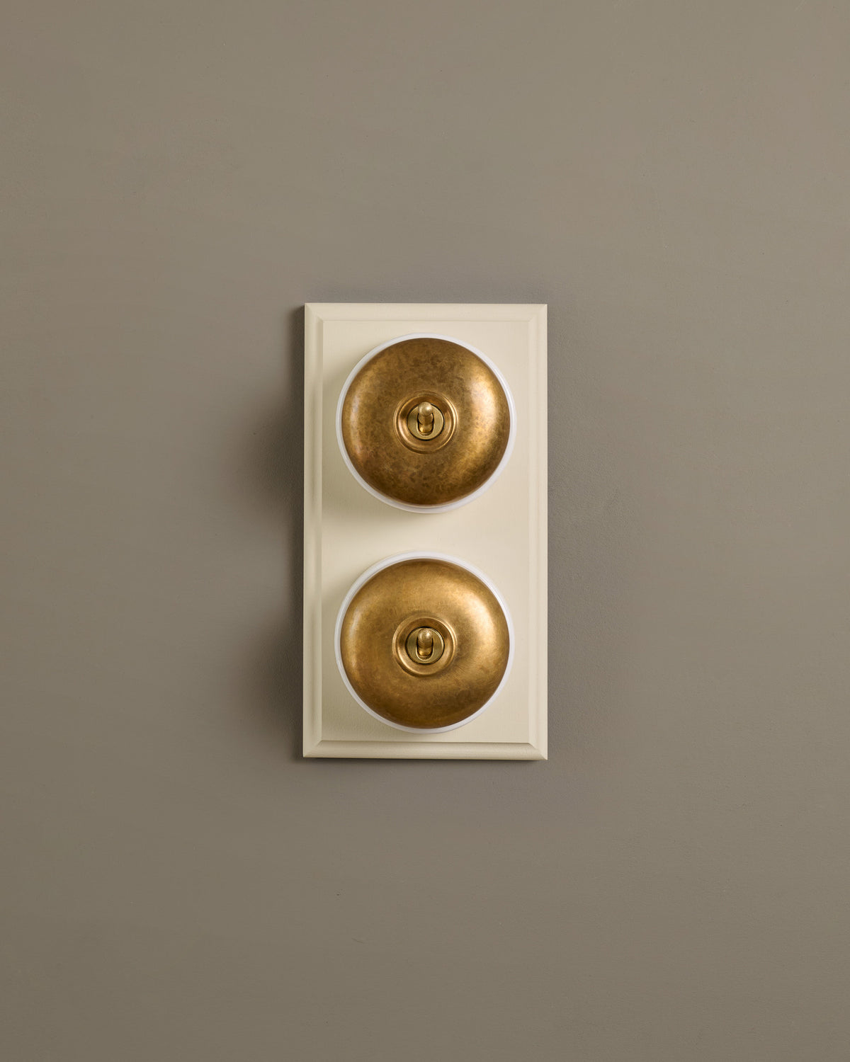 The Dolly Toggle Switch (2 Gang & Primed Maple Pattress) - Aged Brass with White Base. TEST