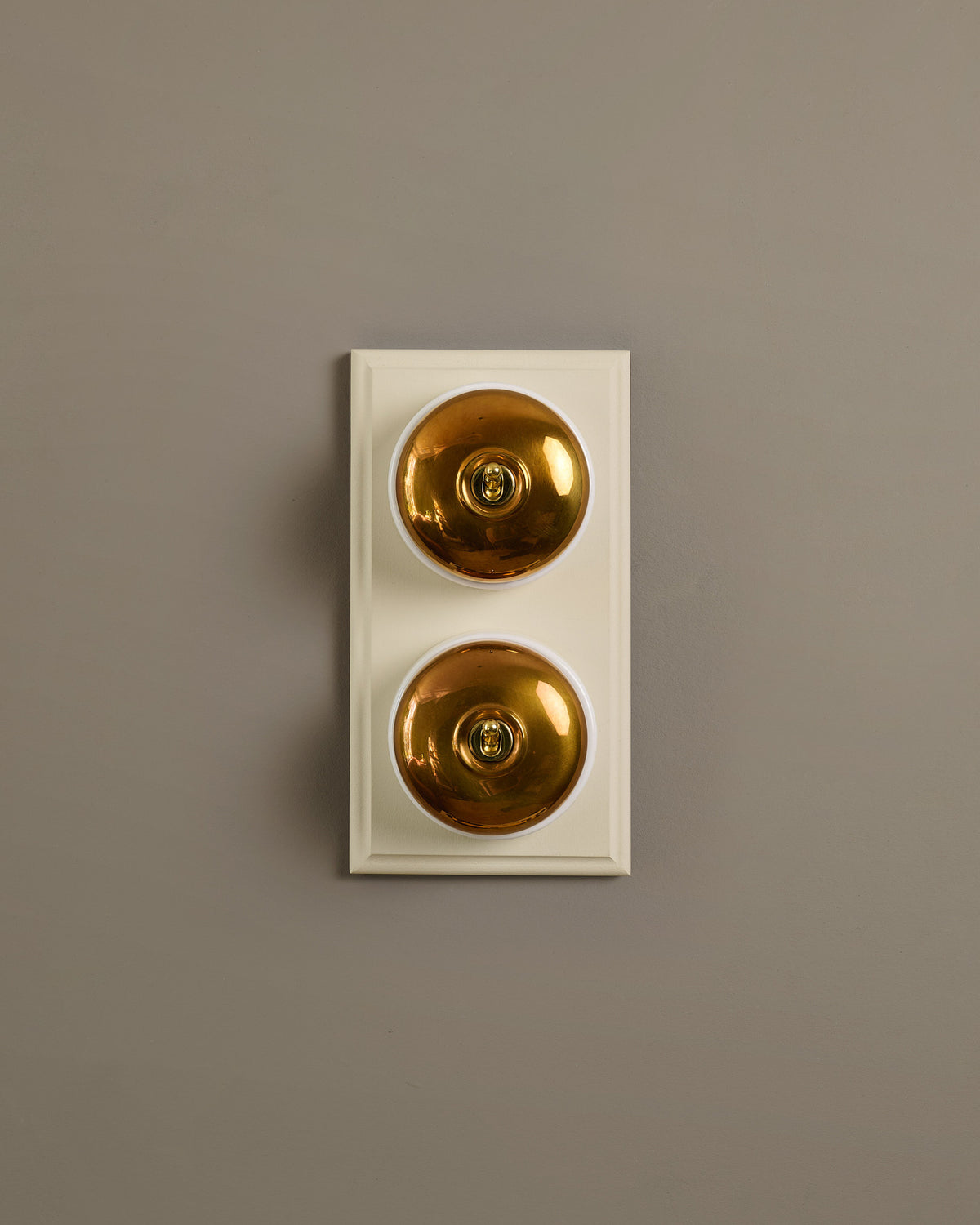 The Dolly Toggle Switch (2 Gang & Primed Maple Pattress) - Heirloom Brass with White Base. TEST