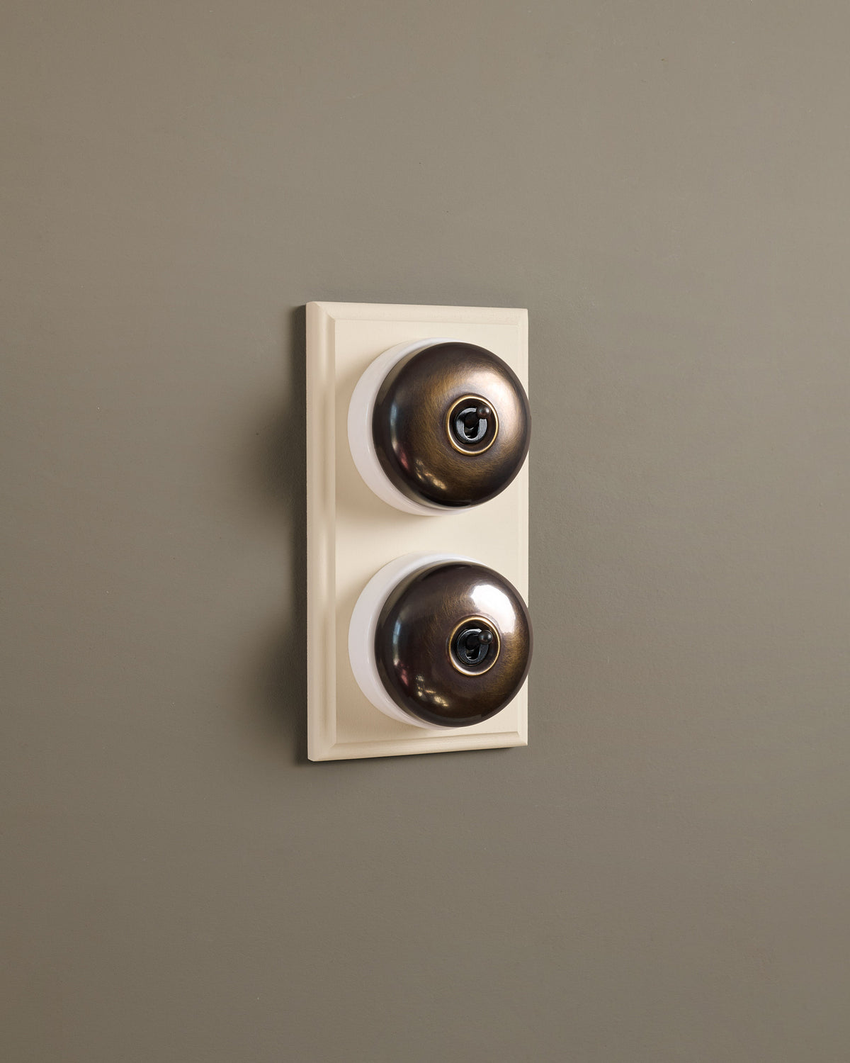 The Dolly Toggle Switch (2 Gang & Primed Maple Pattress) - Oxidised Brass with White Base. TEST