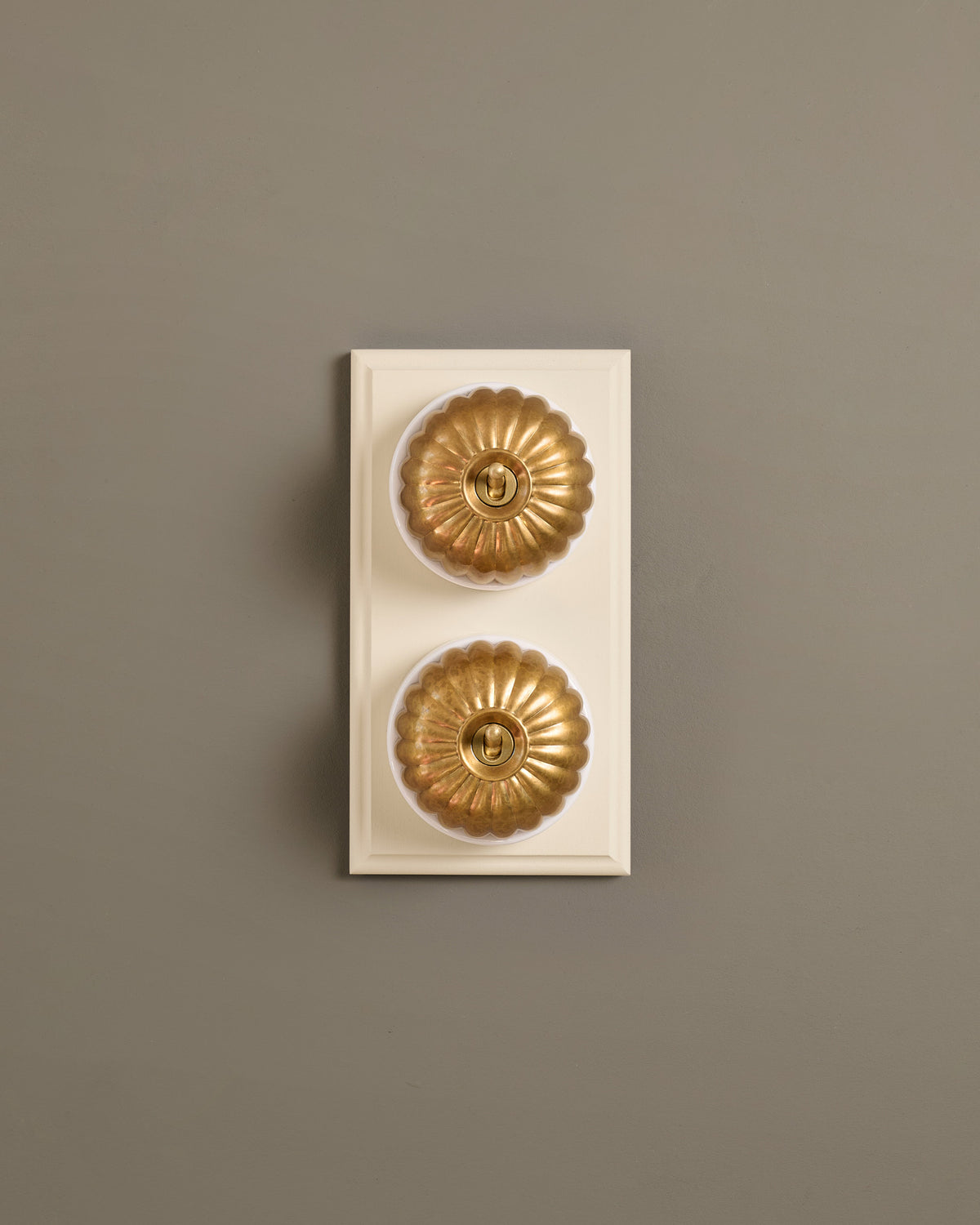 The Jelly Toggle Switch (2 Gang & Primed Maple Pattress) - Aged Brass with White Base. TEST