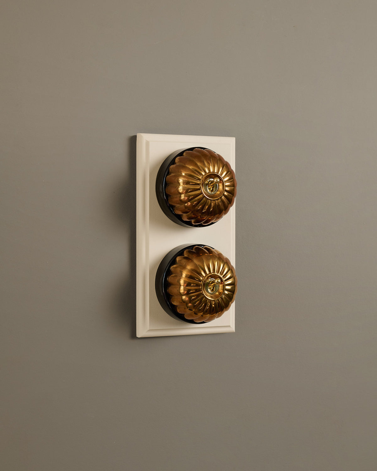 The Jelly Toggle Switch (2 Gang & Primed Maple Pattress) - Heirloom Brass with Black Base. TEST