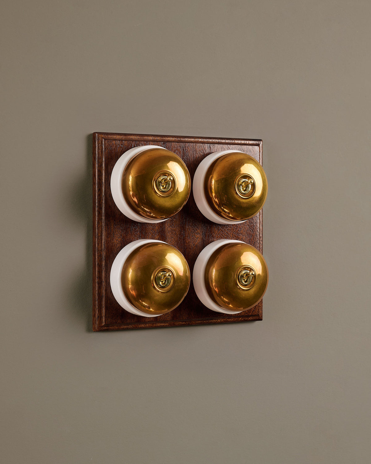 The Dolly Toggle Switch (4 Gang Bank & Mahogany Finish Pattress) - Heirloom Brass with White Base. TEST