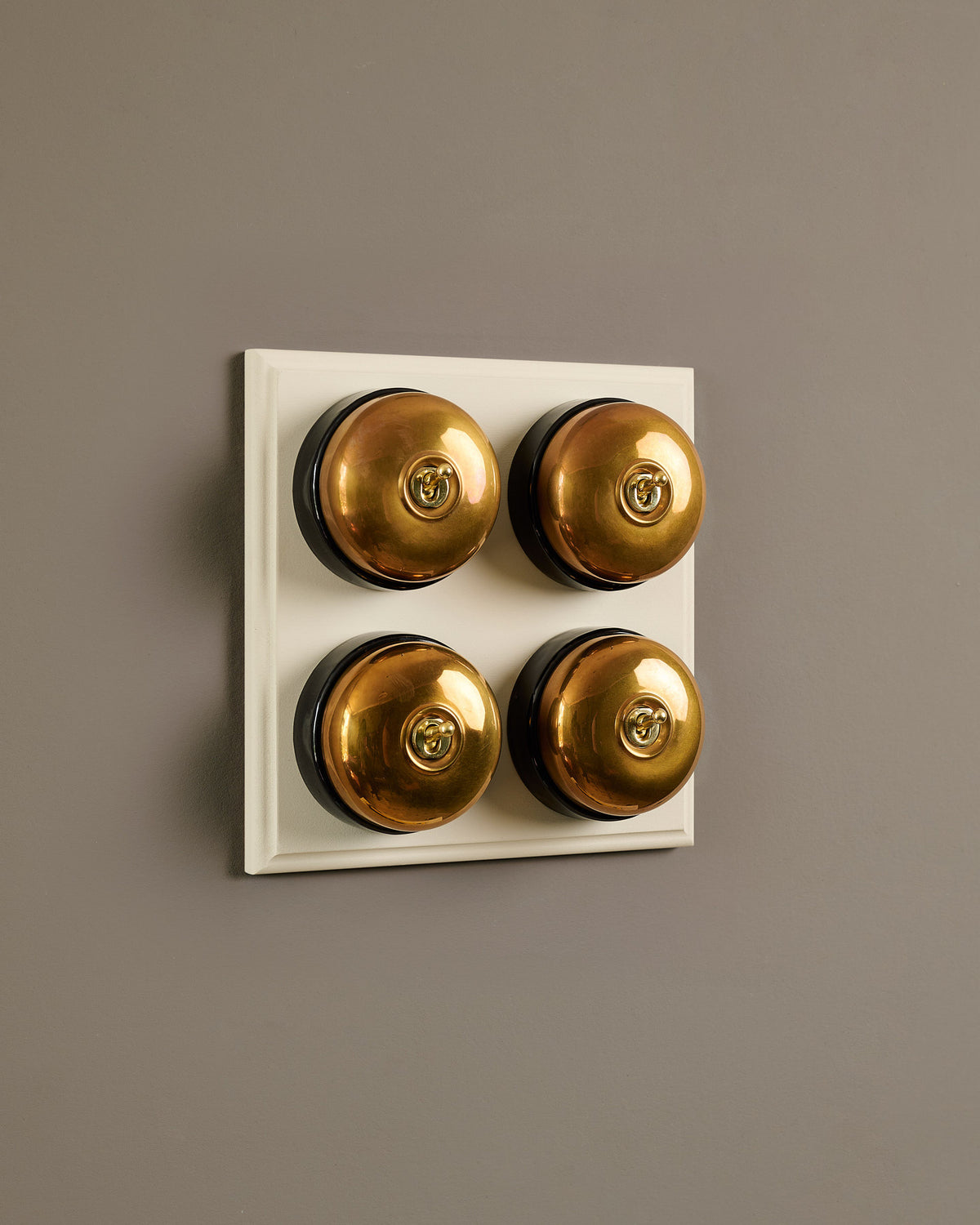 The Dolly Toggle Switch (4 Gang Bank & Primed Maple Pattress) - Heirloom Brass with Black Base. TEST