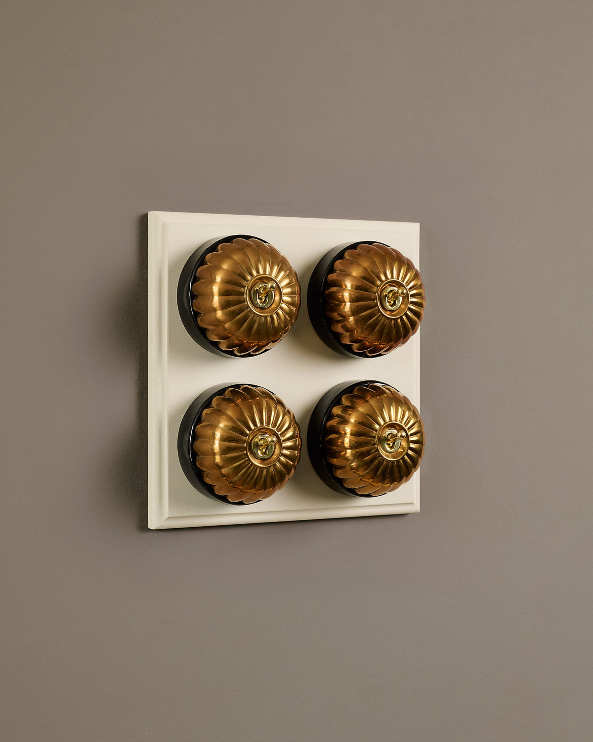 The Jelly Toggle Switch (4 Gang Bank & Primed Maple Pattress) - Heirloom Brass with Black Base. TEST