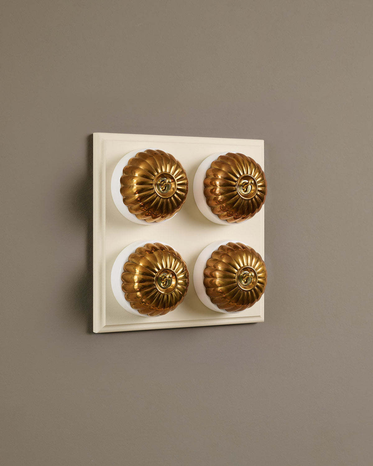 The Jelly Toggle Switch (4 Gang Bank & Primed Maple Pattress) - Heirloom Brass with White Base. TEST