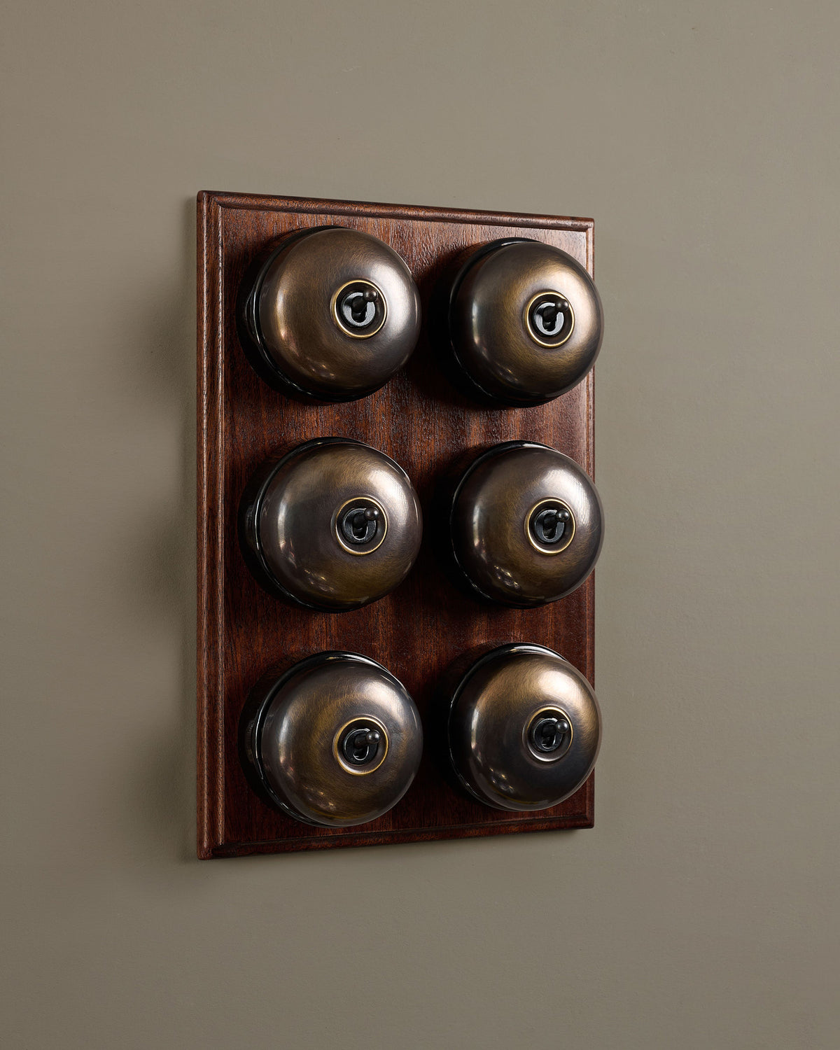 The Dolly Toggle Switch (6 Gang & Mahogany Finish Pattress) - Oxidised Brass with Black Base. TEST