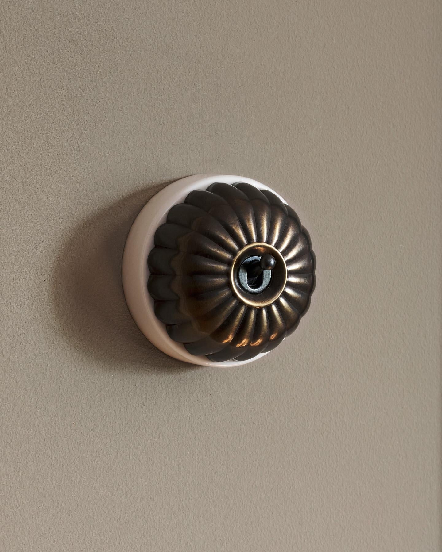 The Jelly Toggle Switch - Oxidised Brass, White Base, Single Way Retract