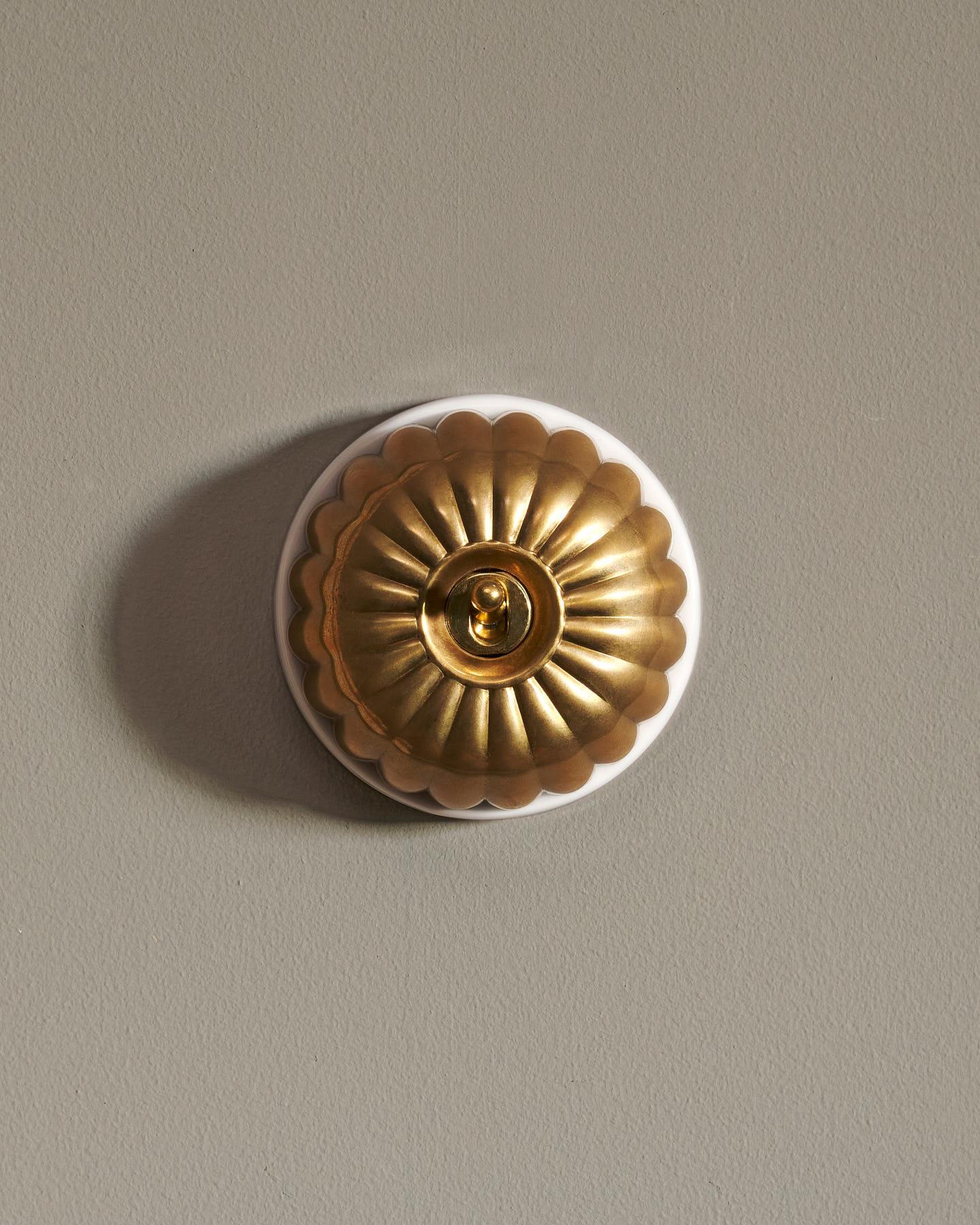 The Jelly Toggle Switch - Heirloom Brass, White Base, Single Way Retract