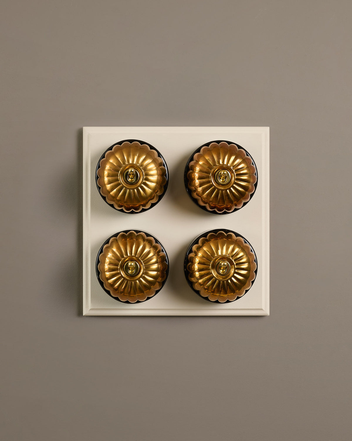 The Jelly Toggle Switch (4 Gang Bank & Primed Maple Pattress) - Heirloom Brass with Black Base. TEST