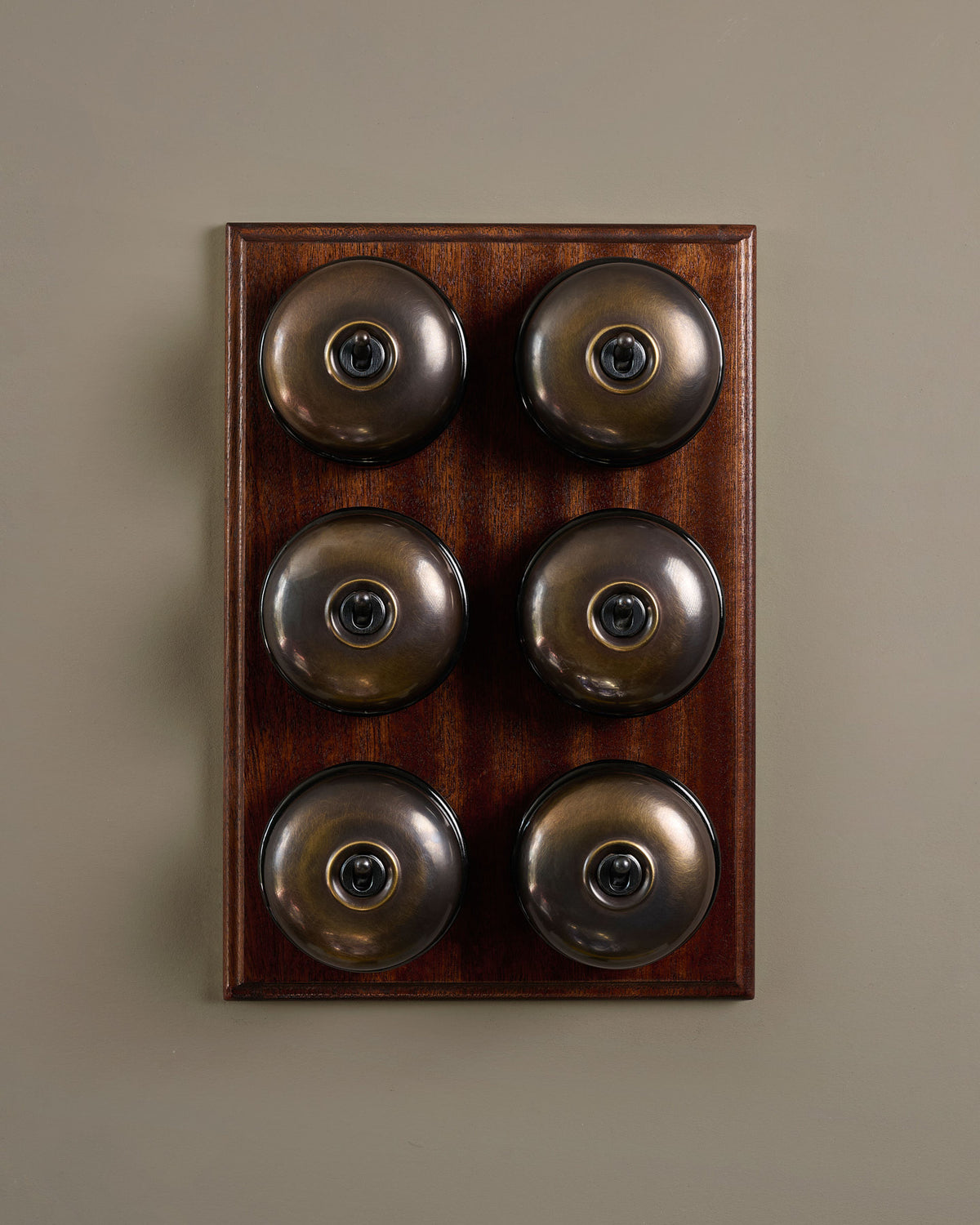 The Dolly Toggle Switch (6 Gang & Mahogany Finish Pattress) - Oxidised Brass with Black Base. TEST