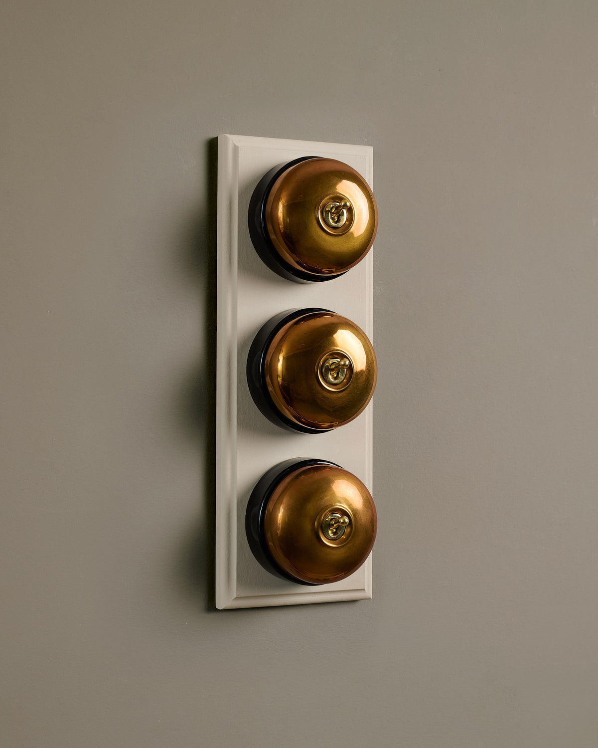 The Dolly Toggle Switch (3 Gang & Primed Maple Pattress) - Heirloom Brass with Black Base. TEST