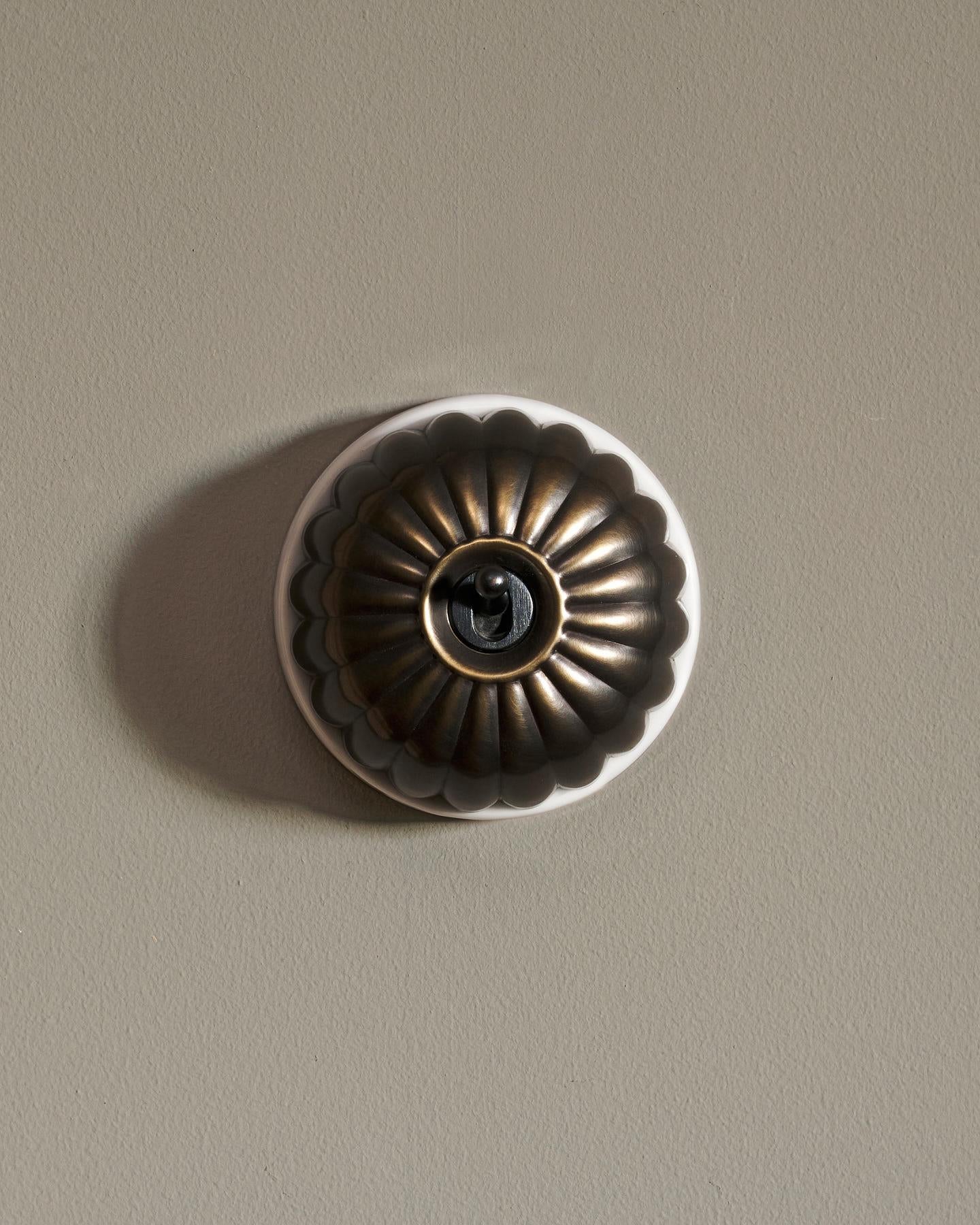 The Jelly Toggle Switch - Oxidised Brass, White Base, Single Way Retract