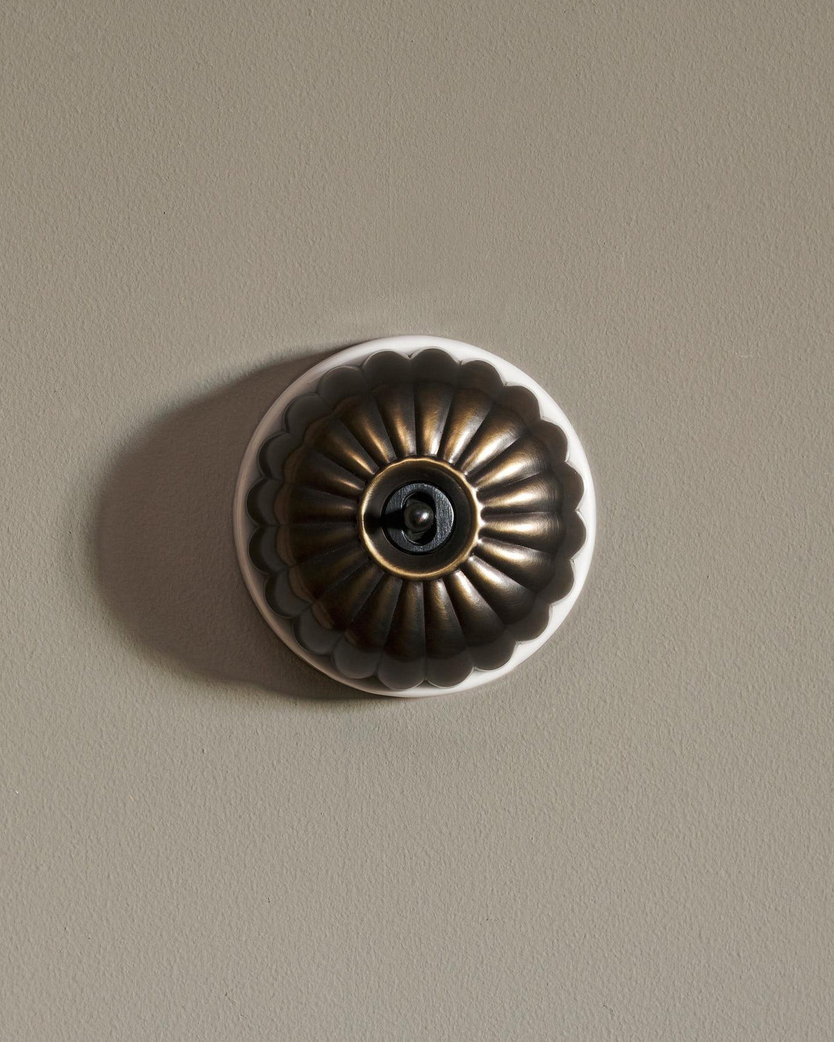The Jelly Toggle Switch - Oxidised Brass, White Base, Retract to Centre TEST