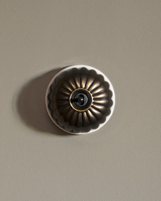 The Jelly Toggle Switch - Oxidised Brass, White Base, Retract to Centre