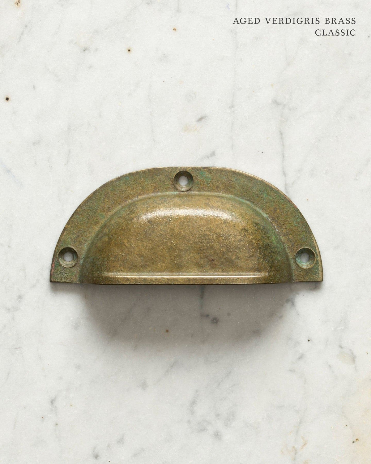 Two classic cup handles for a kitchen cupboard or drawer with an aged verdigris brass finish. There is a large and a small size. TEST