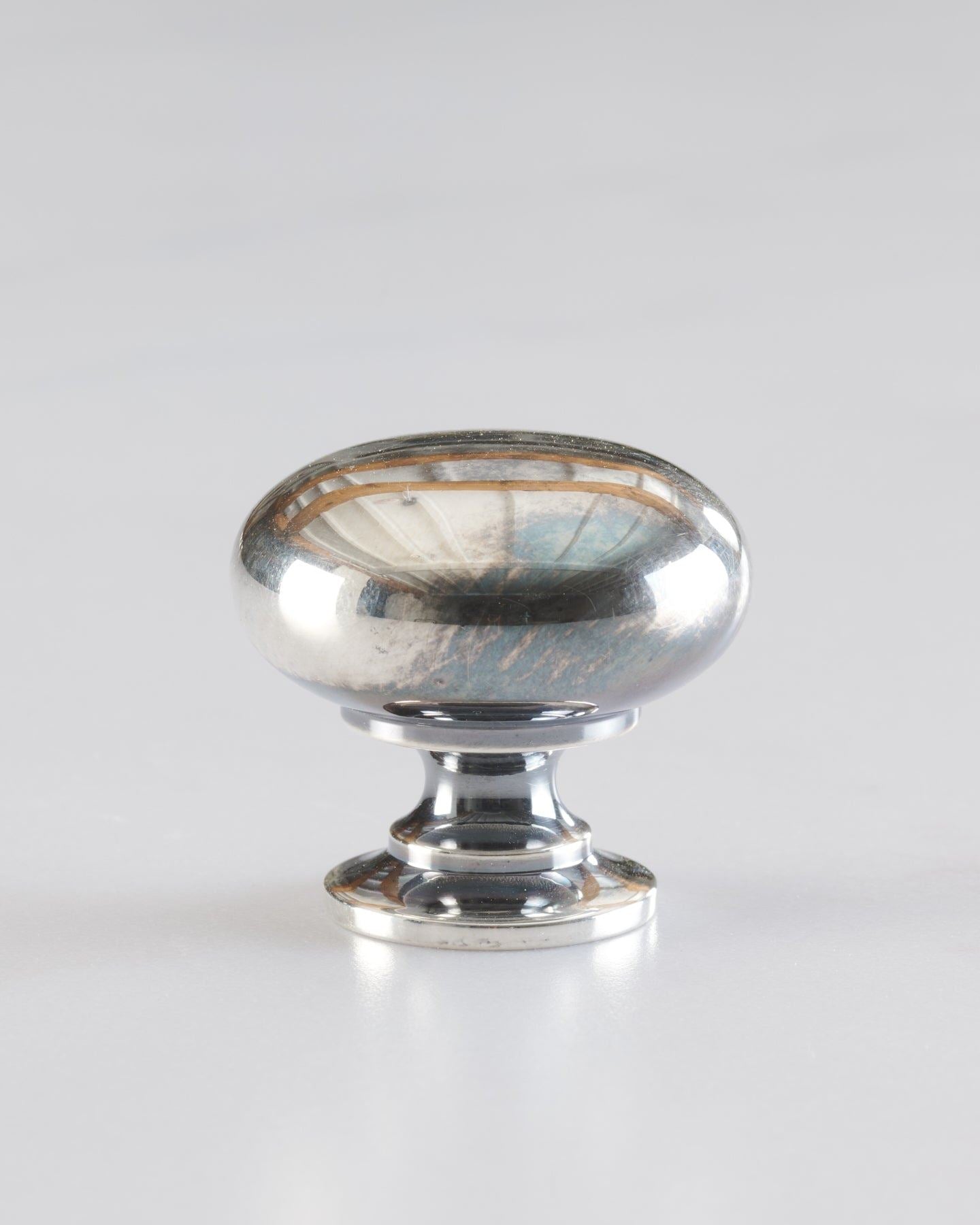 A 'Large' classic knob for a kitchen cupboard or drawer with a tarnished silver finish.