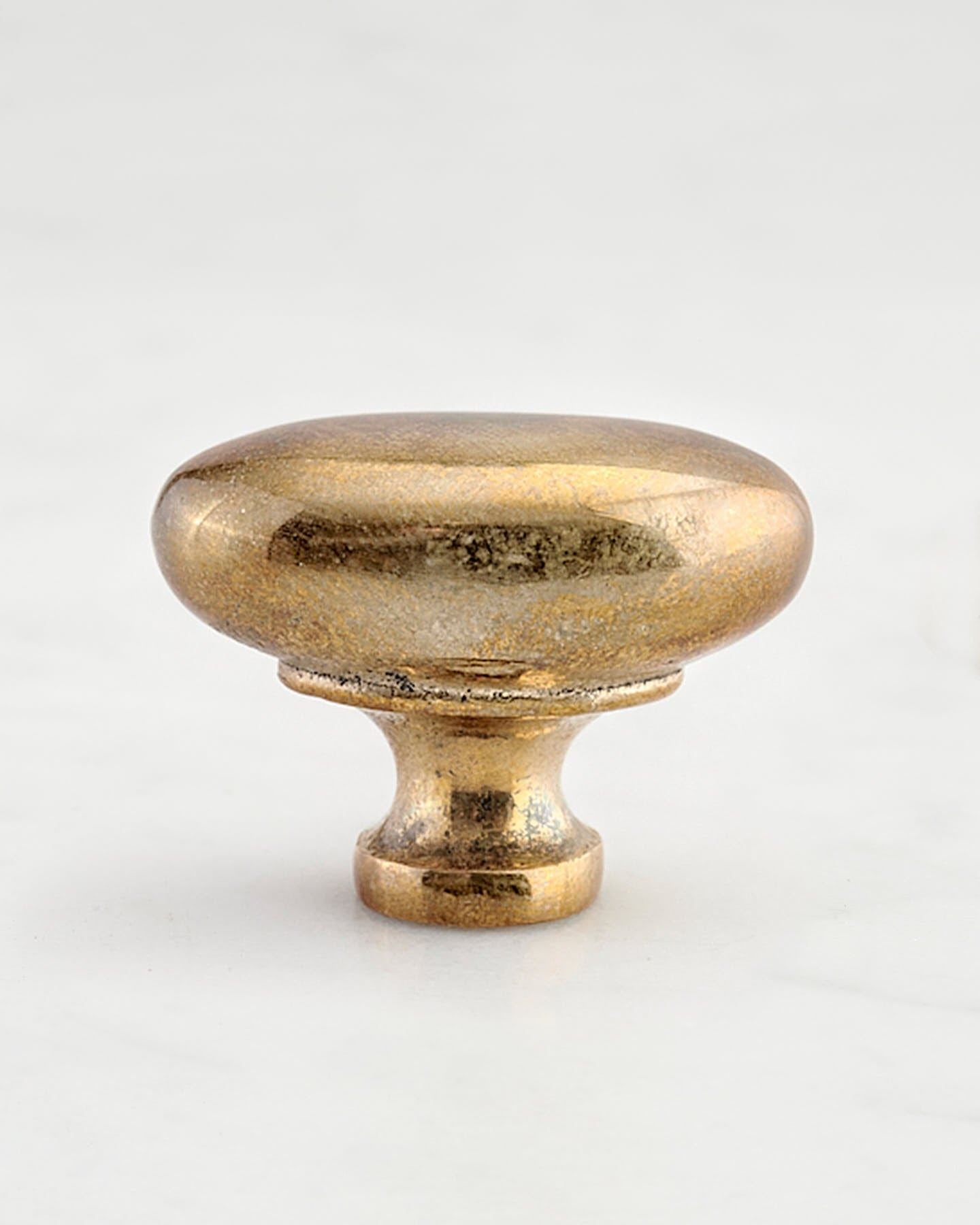 A 'Large' oval-shaped knob for a kitchen cupboard or drawer with a bright polished bronze finish.